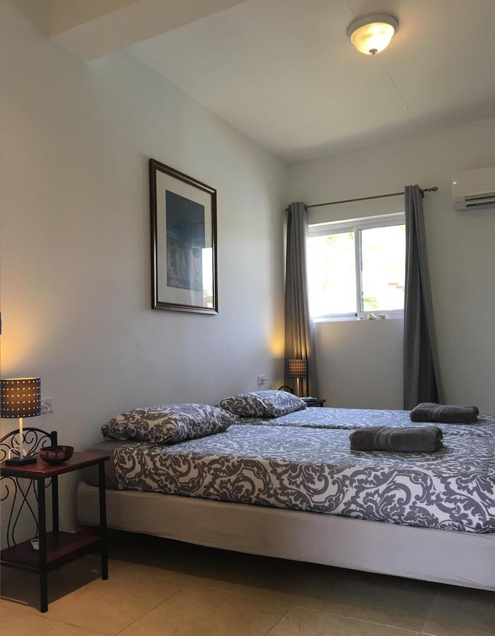 Appartement Bubali Gardens à Palm Beach Extérieur photo